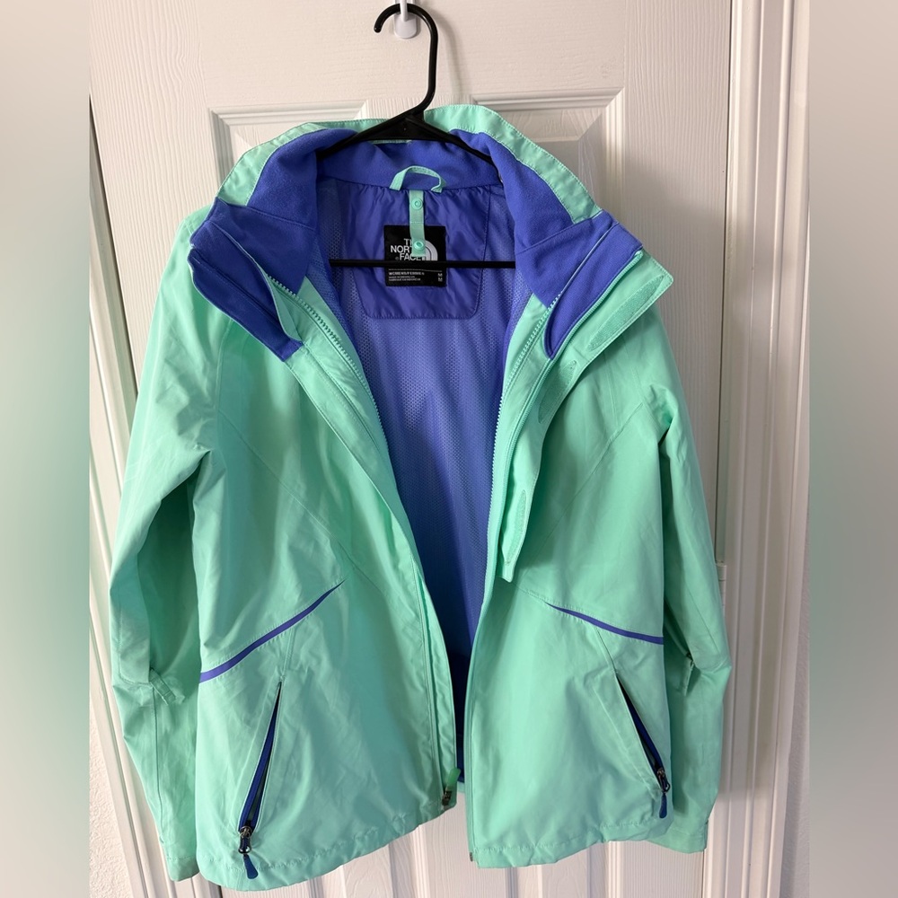 The North Face Women's Aqua and Royal Blue rain coat